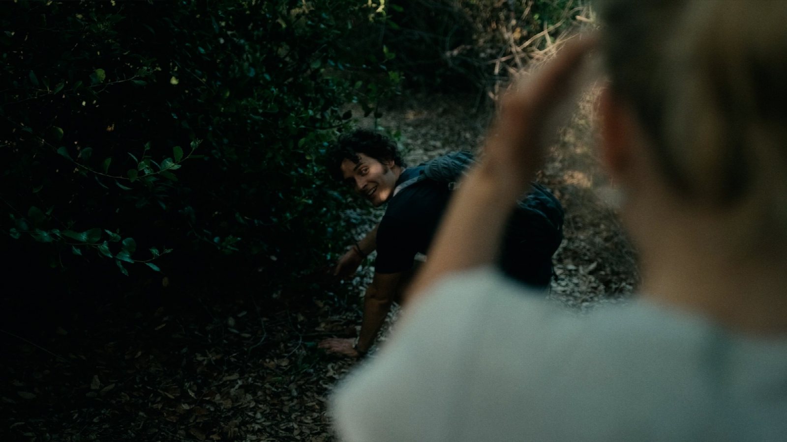 Two actors on a forest hike; tense framing for Best Friends with the Devil